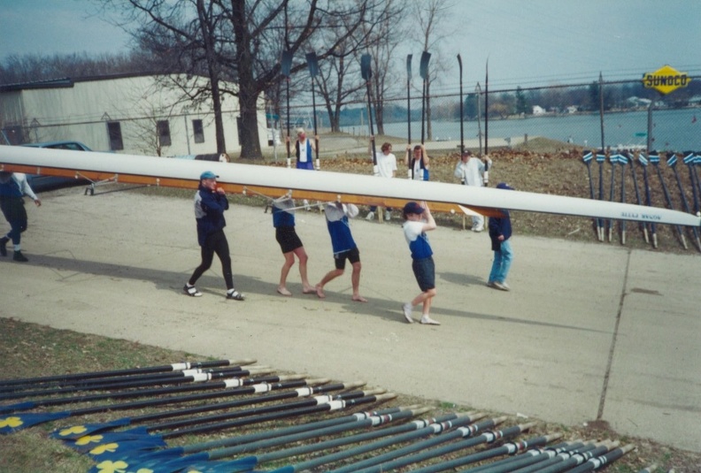 Men_s 8 - Carrying the Pytte to the dock.jpg